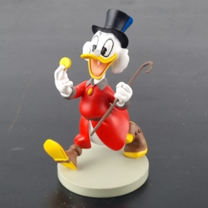 Scrooge McDuck running with his lucky dime statue by Hachette