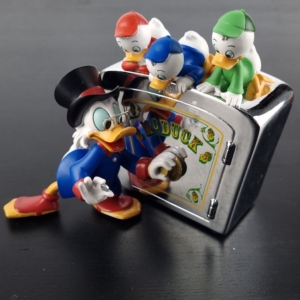 Scrooge McDuck with nephews money box