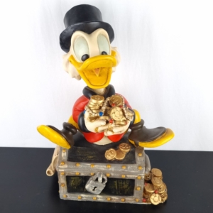 Scrooge McDuck sitting on treasury Big Polyester statue