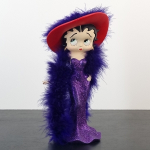 Vintage statue of Betty Boop in a sparkling purple dress