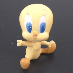 Baby Tweety figurine sitting with arms open