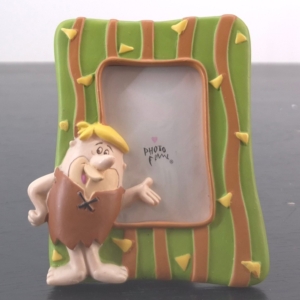 Barney Rubble Flintstones photo frame with green prehistoric-style background