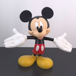 Large Mickey Mouse statue with open arms in classic red shorts and yellow shoes