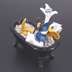 Statue of Donald Duck taking a bath