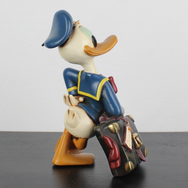 Donald Duck relaxing on his suitcase statue _medium version _right back - Donald Duck relaxing on his suitcase statue _medium version _right back