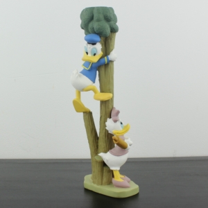 Donald and Daisy Duck candle stand