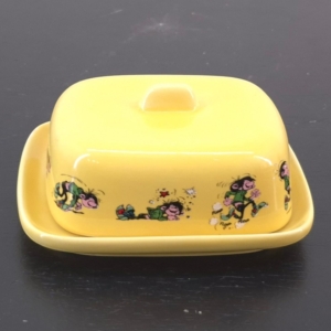 yellow Gaston Lagaffe butter dish with comic strip illustrations