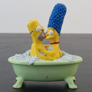 Statue of Homer and Marge Simpson in bath