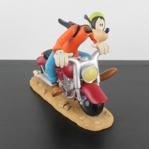 Vintage Goofy on a motor statue by Walt Disney