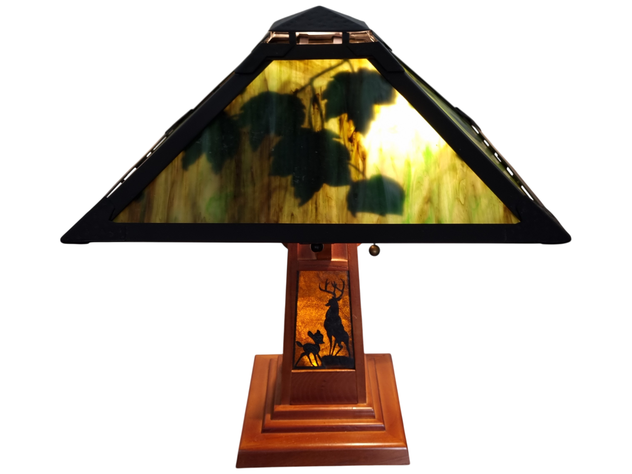 Kevin and Jody Disney Catalog Bambi Tiffany-Style Lamp - Kevin and Jody Disney Catalog Bambi Tiffany-style lamp with illuminated forest shade and Bambi silhouette detail.