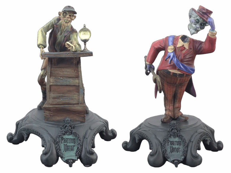 Two Kevin and Jody Phantom Manor Disney Parks statues shown as sculptural display pieces with detailed bases.