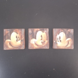 Mickey Mouse face wall art set by Stefan Lindahl with three sepia designs