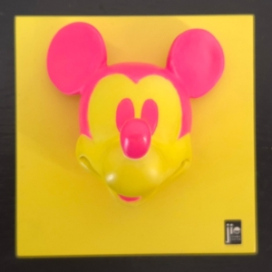 Mickey Mouse wall decoration with yellow background and pink character face