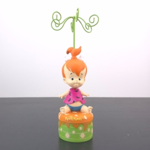 Pebbles Flintstones Jewellery Holder - Pebbles Flintstone jewelry holder with green base and curled wire stand
