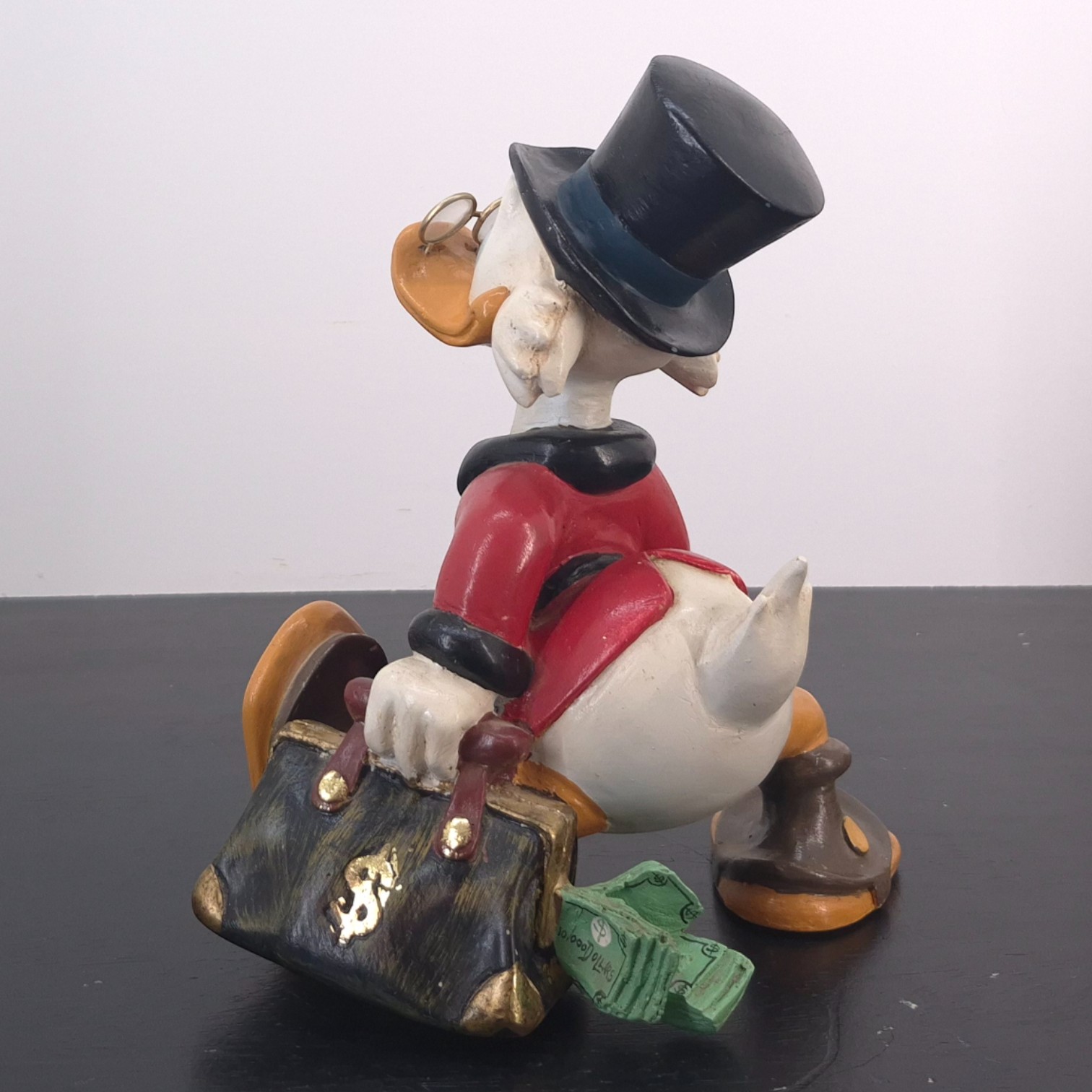 Scrooge McDuck With a Suitcase Full of Money - Small Version _left back - Scrooge McDuck With a Suitcase Full of Money - Small Version _left back