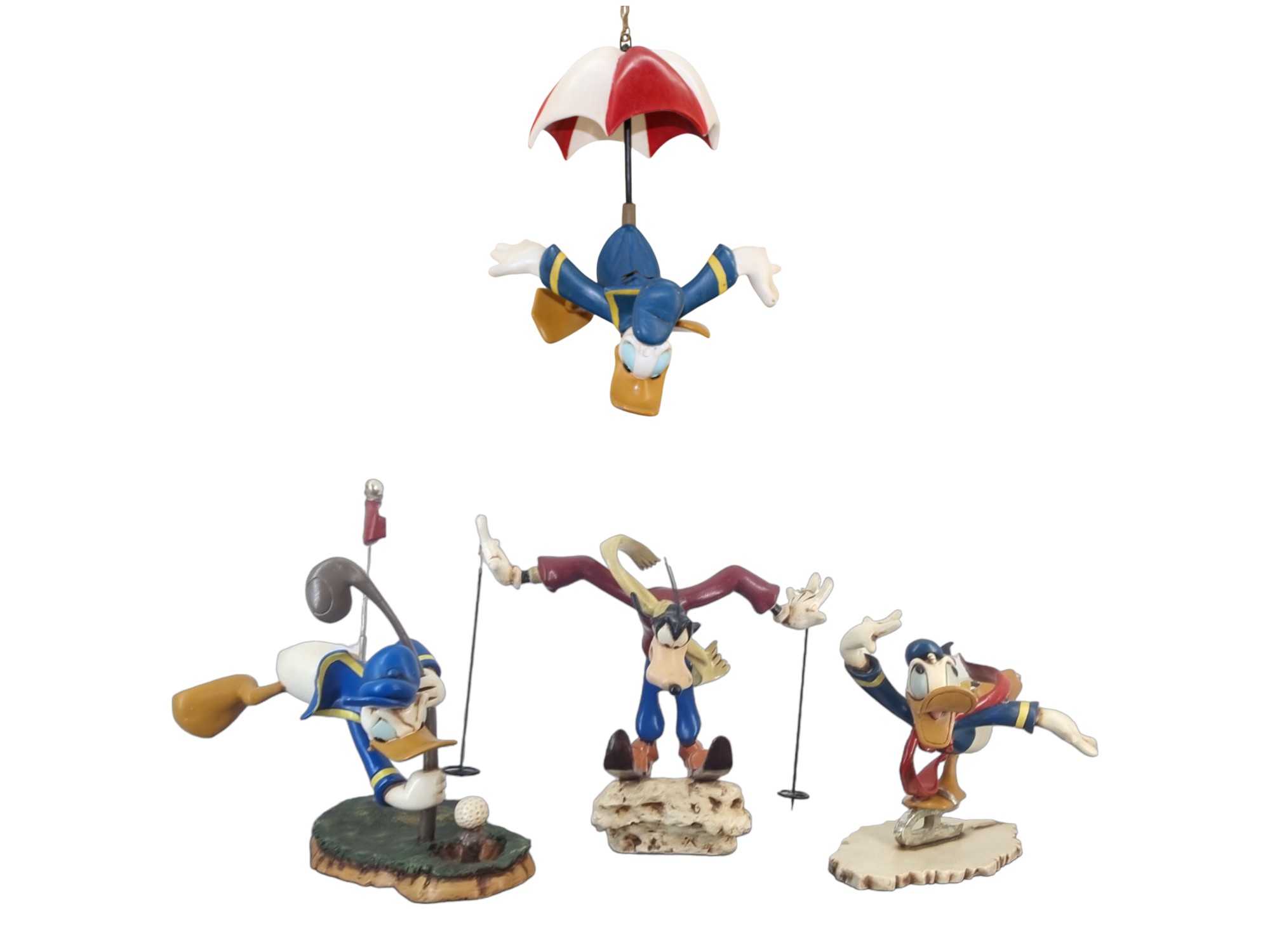 Donald Ice Skater Statue with the Other Sport Statues Stefan Toth Walt Disney Sport Statues