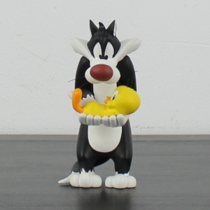 Sylvester the Cat holding Tweety Bird figurine demons merveilles