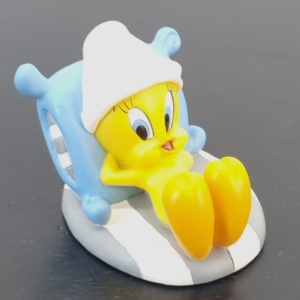 Tweety Bird figurine ready to go to sleep