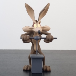 Wile E. Coyote at a detonator figurine