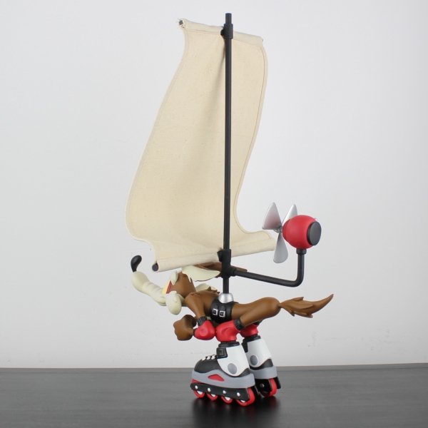Wile E Coyote on skates with a giant windbreak _left back - Wile E Coyote on skates with a giant windbreak _left back