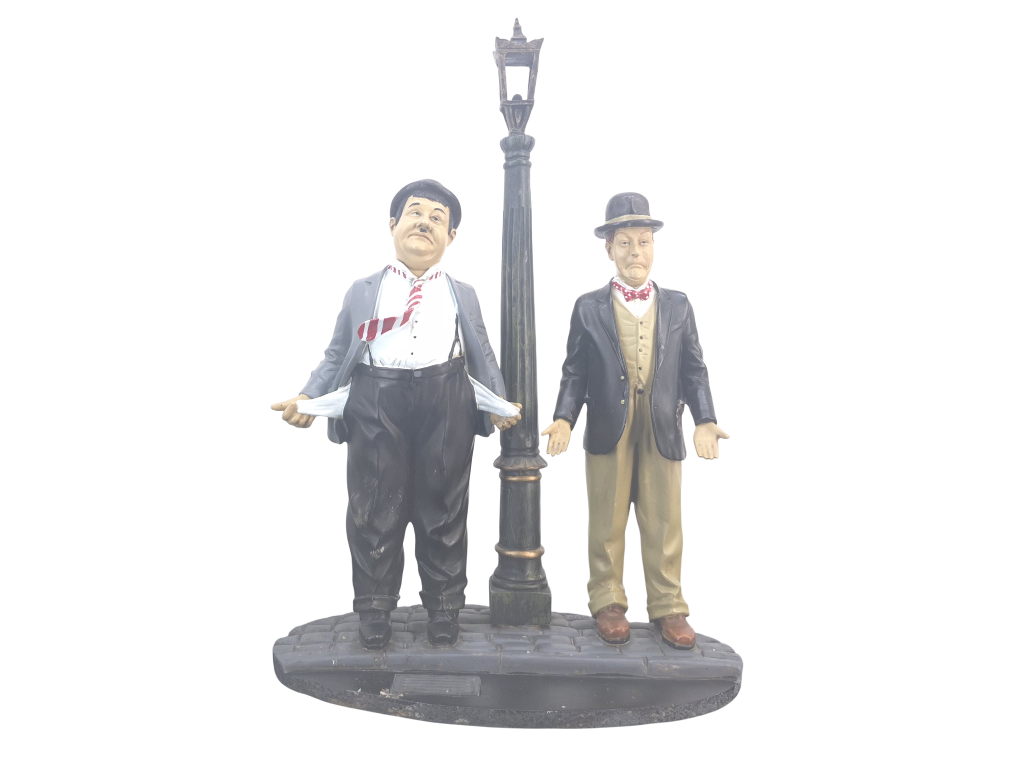 Laurel and Hardy statue collectible designed as a centerpiece display showing the duo in a classic comedy scene